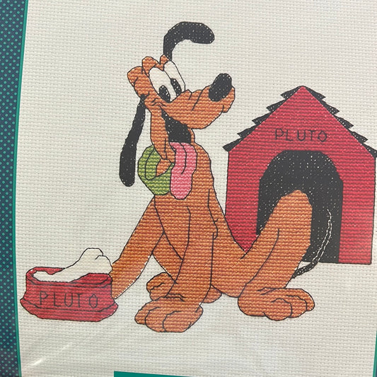 Pluto in the Dog House